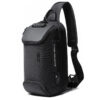 Black Commuter sling pack with a TSA lock on top.